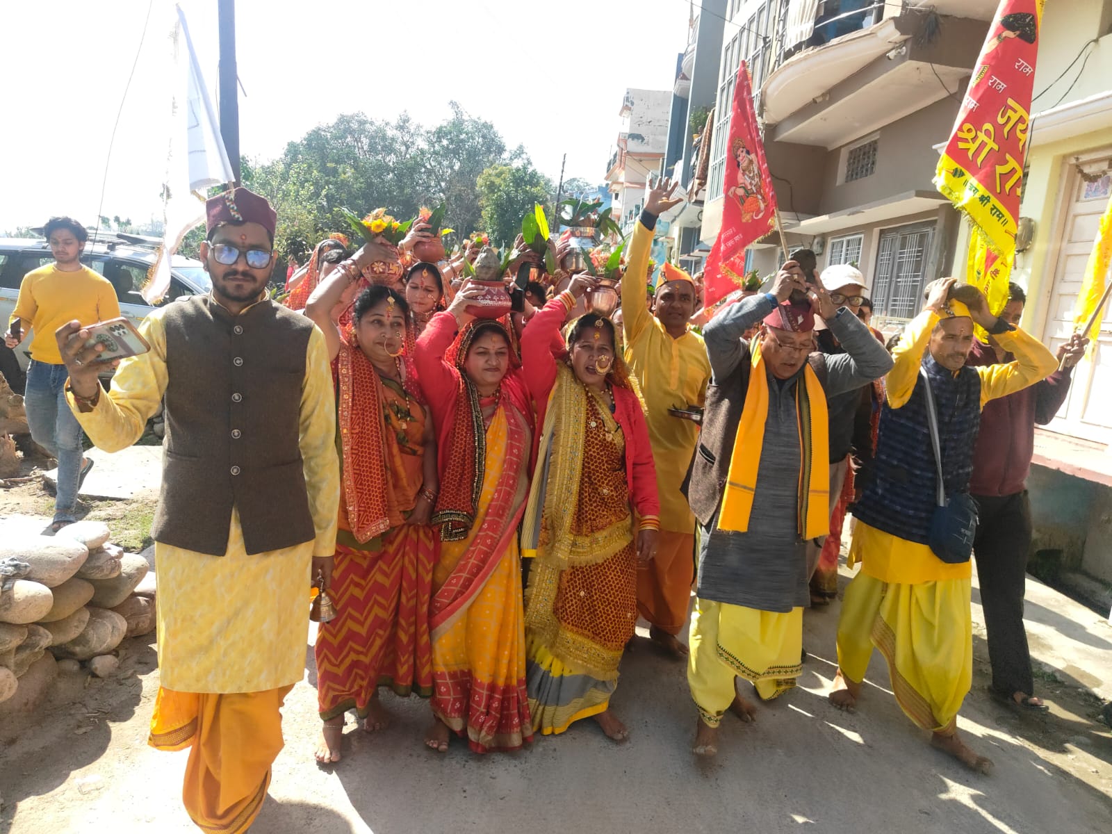 Panditji blessing devotee families